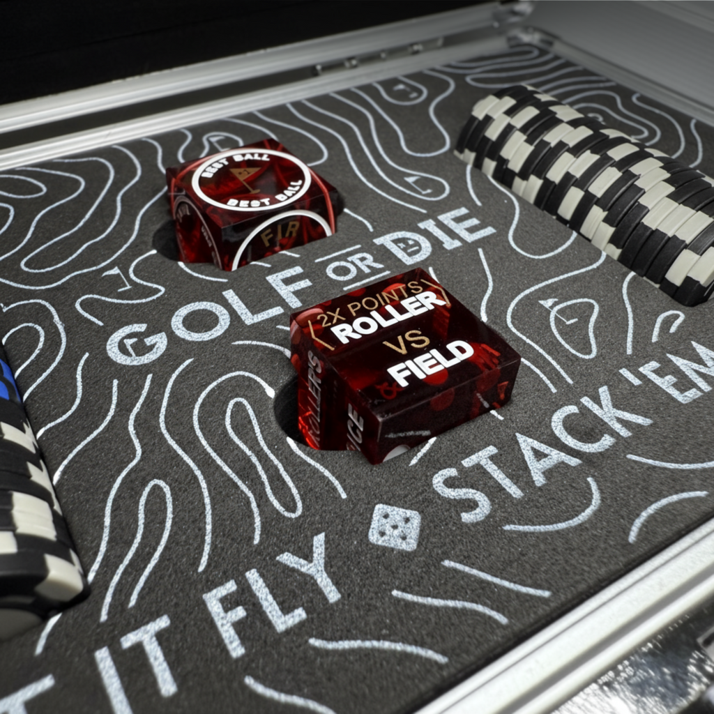 Game set with two red dice with text on a gray surface with text and patterns.